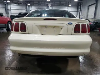 1996 Ford Mustang with VIN 1FALP4045TF168100, listed as a Copart auction lot 60464845 with 116,702 mi miles and Salvage title. Bid and sale history available at DreamBid. Image 6.