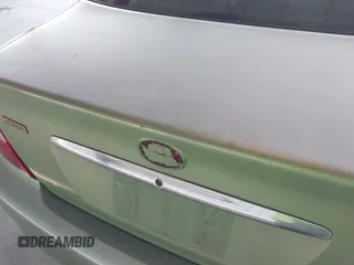 2002 Toyota Camry LE z VIN 4T1BE30K02U096796, wystawiony jako IAAI lot #42230108 z przebiegiem 249 883 mil mil oraz . Historia ofert i sprzedaży dostępna na DreamBid. Obrazek 13.