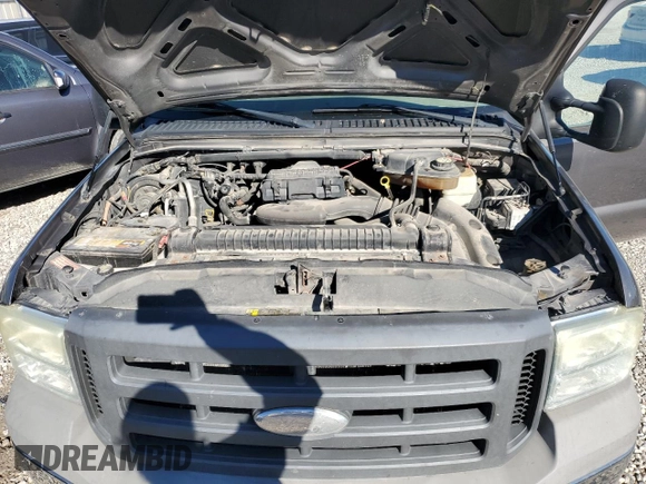 2005 Ford F-250 XL with VIN 1FTNX20575EC72208, listed as a Copart auction lot 80670874 with 215,484 mi miles and Salvage title. Bid and sale history available at DreamBid. Image 12.