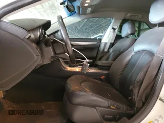 2012 Cadillac CTS with VIN 1G6DA5E52C0131731, listed as a Copart auction lot 59223235 with 104,521 mi miles and Salvage title. Bid and sale history available at DreamBid. Image 7.