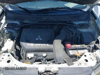 2007 Mitsubishi Outlander XLS z VIN JA4MT41X87Z022372, wystawiony jako IAAI lot #42342600 z przebiegiem 190 073 mil mil oraz . Historia ofert i sprzedaży dostępna na DreamBid. Obrazek 10.