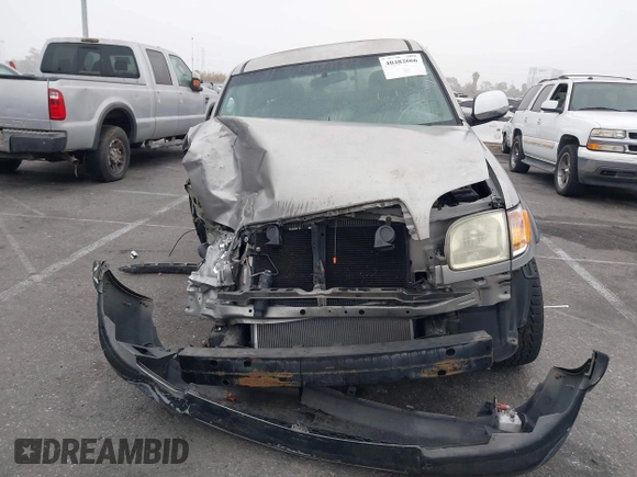 2003 Toyota Tundra SR5 with VIN 5TBBT44113S350273, listed as a IAAI auction lot 40482066 with 219,831 mi miles and . Bid and sale history available at DreamBid. Image 13.