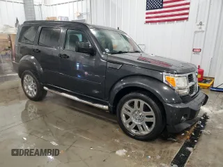 2010 Dodge Nitro SE with VIN 1D4PU2GK3AW144889, listed as a Copart auction lot 84314234 with 115,419 mi miles and Non Repairable. Bid and sale history available at DreamBid. Image 4.
