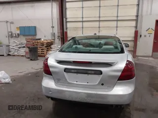 2004 Pontiac Grand Prix GT2 z VIN 2G2WS522641126247, wystawiony jako IAAI lot #42338014 z przebiegiem 236 735 mil mil oraz . Historia ofert i sprzedaży dostępna na DreamBid. Obrazek 16.