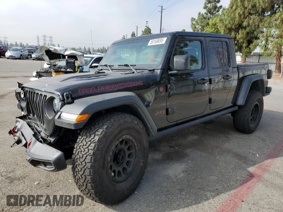 2020 Jeep Gladiator Rubicon z VIN 1C6JJTBG7LL197837, wystawiony jako Copart lot #58169095 z przebiegiem 59 578 mil mil oraz Szkoda całkowita • Salvage title. Historia ofert i sprzedaży dostępna na DreamBid. Obrazek 1.