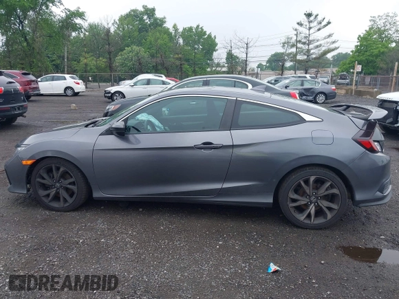 2017 Honda Civic Si with VIN 2HGFC3A50HH752223, listed as a IAAI auction lot 42273886 with 76,454 mi miles and . Bid and sale history available at DreamBid. Image 14.