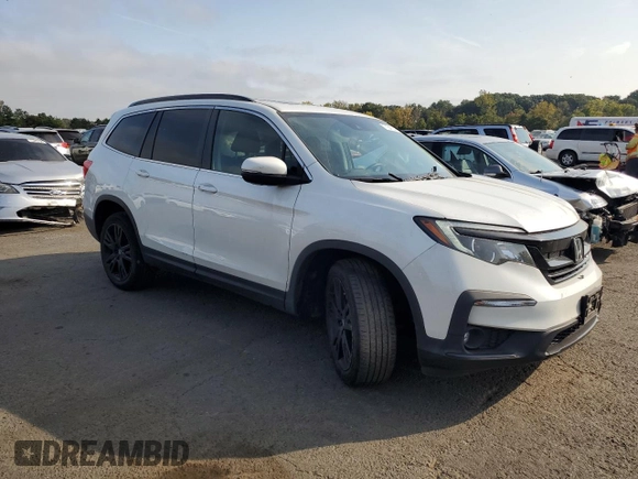 2021 Honda Pilot Special Edition with VIN 5FNYF6H27MB102574, listed as a Copart auction lot 71641744 with 34,772 mi miles and Salvage Title. Bid and sale history available at DreamBid. Image 4.