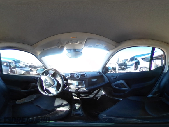 2015 Smart fortwo Passion z VIN WMEEJ3BA0FK812519, wystawiony jako Copart lot #47236285 z przebiegiem 122 139 mil mil oraz Szkody całkowita. Historia ofert i sprzedaży dostępna na DreamBid. Obrazek 14.