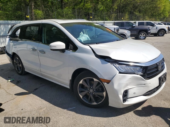 2022 Honda Odyssey Touring with VIN 5FNRL6H8XNB501482, listed as a Copart auction lot 52148875 with 32,568 mi miles and Salvage title. Bid and sale history available at DreamBid. Image 4.