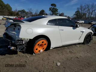 2018 Nissan GT-R Premium с VIN JN1AR5EF9JM710421, выставлен на аукционе Copart как лот 84895244 с пробегом 27 217 миль миль и Списание • Salvage title. История ставок и продаж доступна на DreamBid. Изображение 3.