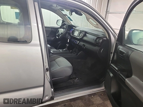 2018 Toyota Tacoma SR with VIN 5TFSX5EN6JX062775, listed as a IAAI auction lot 42774090 with 146,583 mi miles and . Bid and sale history available at DreamBid. Image 51.
