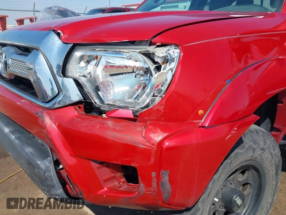 2014 Toyota Tacoma with VIN 5TFUU4EN7EX084785, listed as a IAAI auction lot 41879329 with 133,216 mi miles and . Bid and sale history available at DreamBid. Image 6.