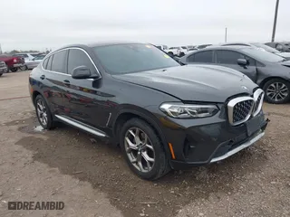 2022 BMW X4 xDrive30i with VIN 5UX33DT07N9M96858, listed as a IAAI auction lot 41242175 with 57,552 mi miles. Bid and sale history available at carsss.com. Image 1.