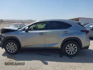 2020 Lexus NX 300 z VIN JTJDARBZ4L2171323, wystawiony jako IAAI lot #41814547 z przebiegiem 42 758 mil mil oraz . Historia ofert i sprzedaży dostępna na DreamBid. Obrazek 14.