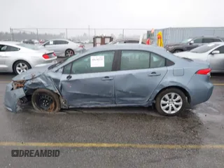 2021 Toyota Corolla LE with VIN 5YFEPMAE8MP242968, listed as a IAAI auction lot 41620339 with 56,752 mi miles and . Bid and sale history available at DreamBid. Image 14.