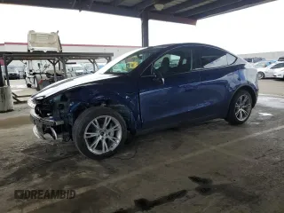 2024 Tesla Model Y Long Range with VIN 7SAYGDEE6RF025366, listed as a Copart auction lot 49328055 with 10,319 mi miles and Salvage Title. Bid and sale history available at DreamBid. Image 1.