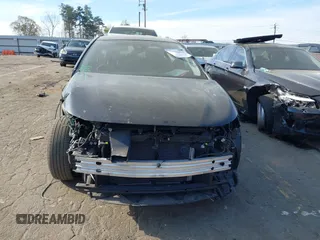 2022 Toyota Corolla LE with VIN JTDEPMAE9NJ209872, listed as a IAAI auction lot 41902891 with 37,479 mi miles and . Bid and sale history available at DreamBid. Image 12.