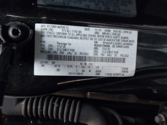 2014 Ford Focus Titanium with VIN 1FADP3J24EL439065, listed as a IAAI auction lot 40868973 with 167,739 mi miles. Bid and sale history available at carsss.com. Image 9.