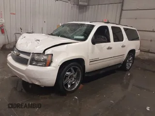 2010 Chevrolet Suburban LTZ with VIN 1GNUKKE32AR271253, listed as a IAAI auction lot 41161374 with 164,184 mi miles. Bid and sale history available at carsss.com. Image 2.