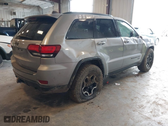 2016 Jeep Grand Cherokee Laredo with VIN 1C4RJFAG6GC366301, listed as a IAAI auction lot 42275011 with 203,133 mi miles and . Bid and sale history available at DreamBid. Image 4.