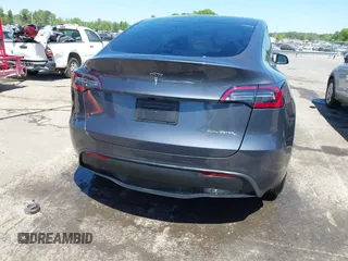 2023 Tesla Model Y Long Range with VIN 7SAYGDEE5PF882582, listed as a IAAI auction lot 42059015 with 10,567 mi miles and . Bid and sale history available at carsss.com. Image 16.