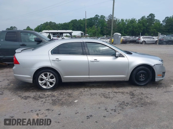 2012 Ford Fusion SE with VIN 3FAHP0HA6CR417306, listed as a IAAI auction lot 42488661 with 183,091 mi miles and . Bid and sale history available at DreamBid. Image 13.