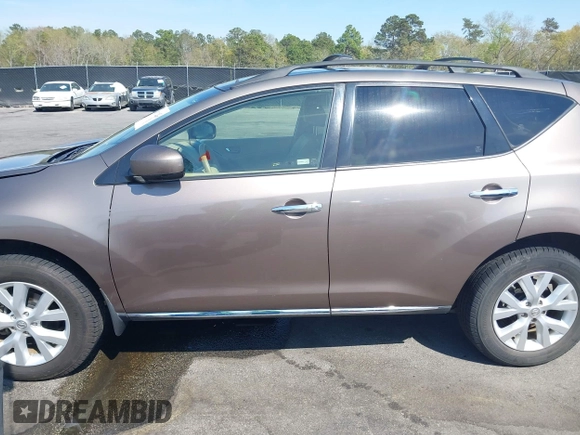 2013 Nissan Murano LE with VIN JN8AZ1MU2DW208076, listed as a IAAI auction lot 41911212 with 127,994 mi miles and . Bid and sale history available at DreamBid. Image 14.
