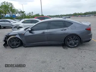 2023 Acura TLX w/A-Spec Package z VIN 19UUB6F58PA006068, wystawiony jako IAAI lot #41922648 z przebiegiem 32 779 mil mil oraz . Historia ofert i sprzedaży dostępna na DreamBid. Obrazek 14.