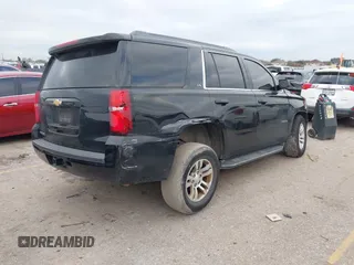 2016 Chevrolet Tahoe LS with VIN 1GNSCAEC3GR360014, listed as a IAAI auction lot 41218354 with Not provided miles and . Bid and sale history available at DreamBid. Image 4.
