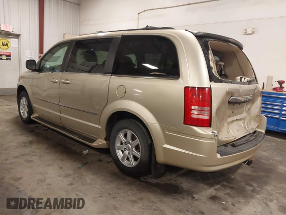 2010 Chrysler Town & Country Touring with VIN 2A4RR5D17AR184092, listed as a IAAI auction lot 41727926 with 158,937 mi miles and . Bid and sale history available at DreamBid. Image 3.