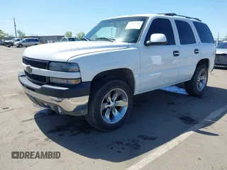 2001 Chevrolet Tahoe LT with VIN 1GNEC13T01J206365, listed as a IAAI auction lot 41960144 with 243,884 mi miles. Bid and sale history available at carsss.com. Image 2.