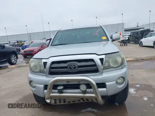 2009 Toyota Tacoma PreRunner with VIN 3TMJU62NX9M081748, listed as a IAAI auction lot 41608525 with 210,999 mi miles. Bid and sale history available at carsss.com. Image 12.