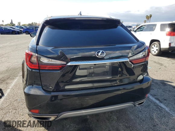 2021 Lexus RX with VIN 2T2HZMAA4MC206615, listed as a Copart auction lot 42412305 with 130,480 mi miles and Salvage Title. Bid and sale history available at carsss.com. Image 6.
