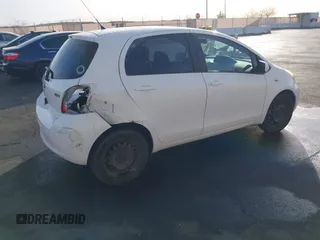 2009 Toyota Yaris with VIN JTDKT903795263620, listed as a IAAI auction lot 41100398 with 66,384 mi miles. Bid and sale history available at carsss.com. Image 4.