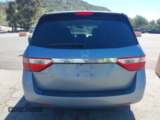 2012 Honda Odyssey EX-L with VIN 5FNRL5H69CB003067, listed as a IAAI auction lot 41862591 with 163,158 mi miles and . Bid and sale history available at carsss.com. Image 16.