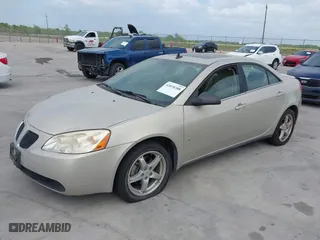 2009 Pontiac G6 w/1SA *Ltd Avail* with VIN 1G2ZG57N394223449, listed as a IAAI auction lot 42070388 with 75,089 mi miles. Bid and sale history available at carsss.com. Image 2.