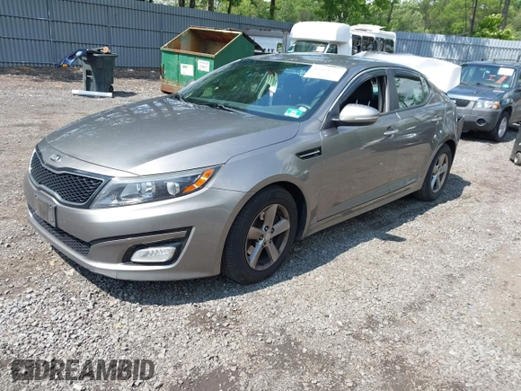 2015 Kia Optima LX z VIN 5XXGM4A73FG375345, wystawiony jako IAAI lot #42373557 z przebiegiem 180 029 mil mil oraz . Historia ofert i sprzedaży dostępna na DreamBid. Obrazek 2.