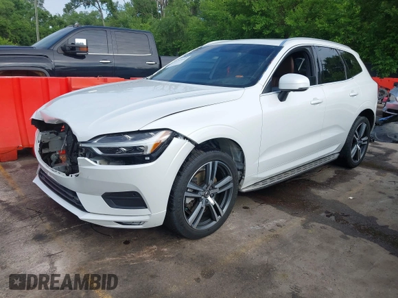 2021 Volvo XC60 Momentum with VIN YV4A22RK8M1696361, listed as a IAAI auction lot 42345602 with 68,574 mi miles and . Bid and sale history available at DreamBid. Image 2.