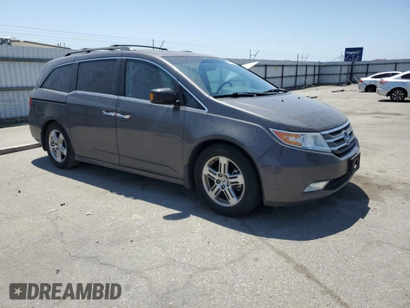 2012 Honda Odyssey Touring с VIN 5FNRL5H9XCB109229, выставлен на аукционе Copart как лот 59885895 с пробегом 153 668 миль миль и Чистый • Clean title. История ставок и продаж доступна на DreamBid. Изображение 4.