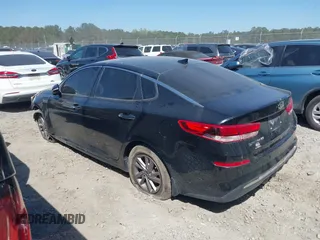 2020 Kia Optima LX z VIN 5XXGT4L32LG421062, wystawiony jako IAAI lot #41879797 z przebiegiem 203 379 mil mil oraz . Historia ofert i sprzedaży dostępna na DreamBid. Obrazek 14.
