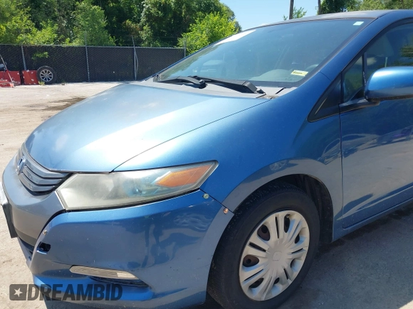 2010 Honda Insight LX with VIN JHMZE2H56AS013649, listed as a IAAI auction lot 42646690 with 5,593 mi miles and . Bid and sale history available at DreamBid. Image 6.