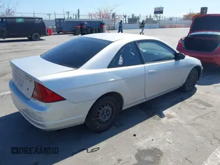 2003 Honda Civic LX with VIN 1HGEM22563L085882, listed as a IAAI auction lot 42227001 with 202,724 mi miles and . Bid and sale history available at DreamBid. Image 4.