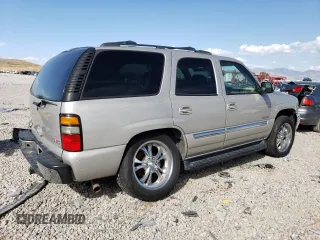 2004 GMC Yukon SLT with VIN 1GKEK13Z04J140148, listed as a Copart auction lot 52411494 with 167,629 mi miles and Salvage Title. Bid and sale history available at carsss.com. Image 3.