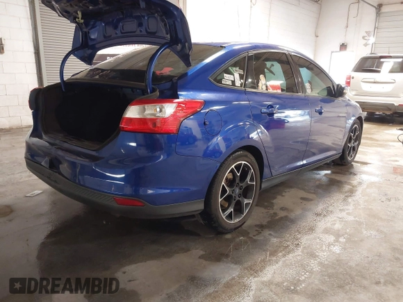 2014 Ford Focus SE with VIN 1FADP3F21EL194900, listed as a IAAI auction lot 41341333 with 103,245 mi miles. Bid and sale history available at carsss.com. Image 4.