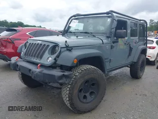 2015 Jeep Wrangler Unlimited Sport with VIN 1C4HJWDG1FL635620, listed as a IAAI auction lot 42396137 with 87,352 mi miles and . Bid and sale history available at DreamBid. Image 18.