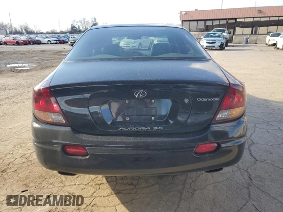 2001 Oldsmobile Aurora with VIN 1G3GR62H714104411, listed as a Copart auction lot 82601984 with 135,486 mi miles and Salvage Title. Bid and sale history available at DreamBid. Image 6.