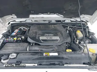 2016 Jeep Wrangler Unlimited Sahara with VIN 1C4BJWEG8GL129577, listed as a IAAI auction lot 42184373 with 185,761 mi miles and . Bid and sale history available at DreamBid. Image 10.