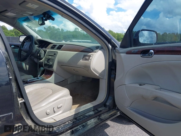 2009 Buick Lucerne CXL with VIN 1G4HD57MX9U127160, listed as a IAAI auction lot 42222588 with 219,611 mi miles and . Bid and sale history available at DreamBid. Image 5.