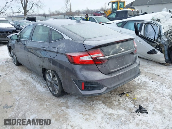 2018 Honda Clarity z VIN JHMZC5F13JC006627, wystawiony jako IAAI lot #41335364 z przebiegiem 58 662 mil mil oraz . Historia ofert i sprzedaży dostępna na DreamBid. Obrazek 3.