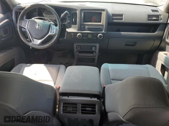 2012 Honda Ridgeline RT with VIN 5FPYK1F25CB451496, listed as a Copart auction lot 62484395 with 169,044 mi miles and Salvage title. Bid and sale history available at DreamBid. Image 8.